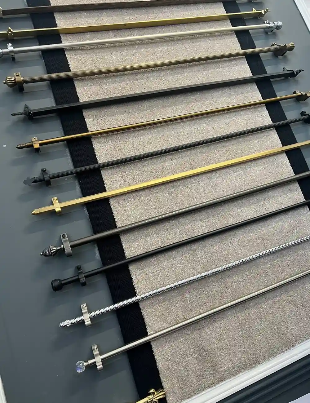 Decorative metal stair carpet rods.